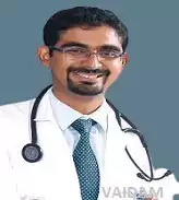 Dr. Tejas Sakale